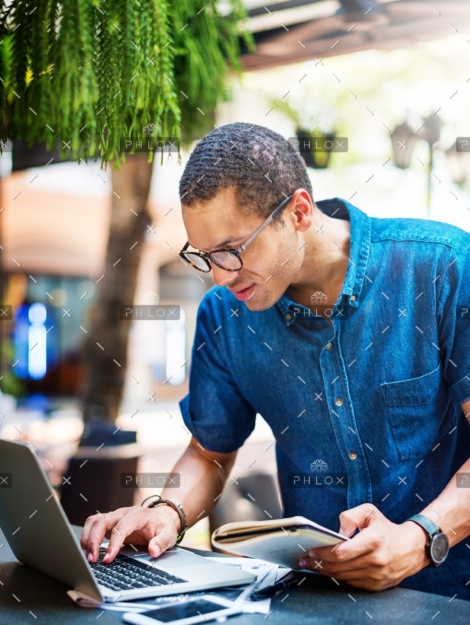 demo-attachment-142-man-working-coffee-shop-connecting-laptop-concept-P3NTZ89